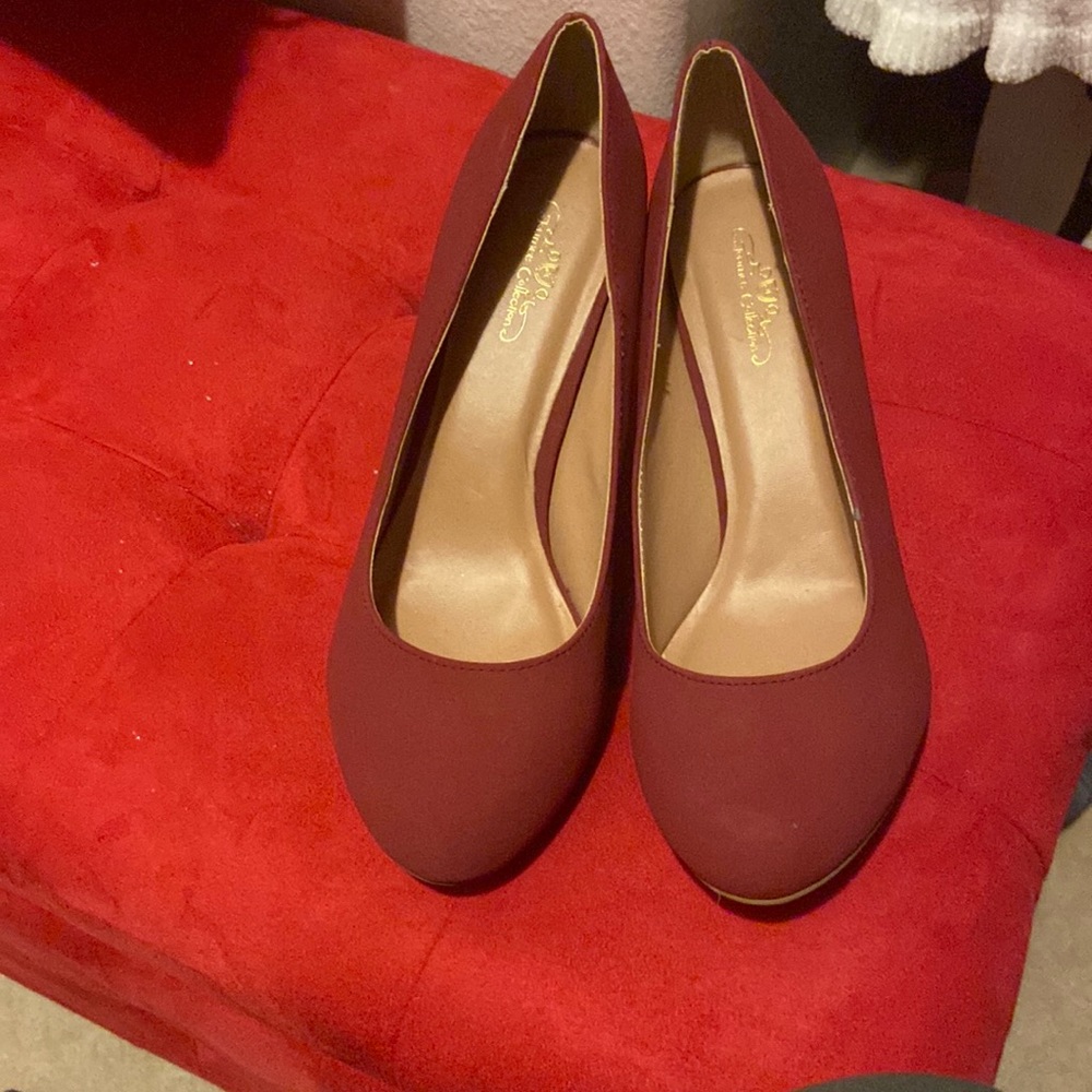 Dark red or burgundy 2 3/4 heel Never worn